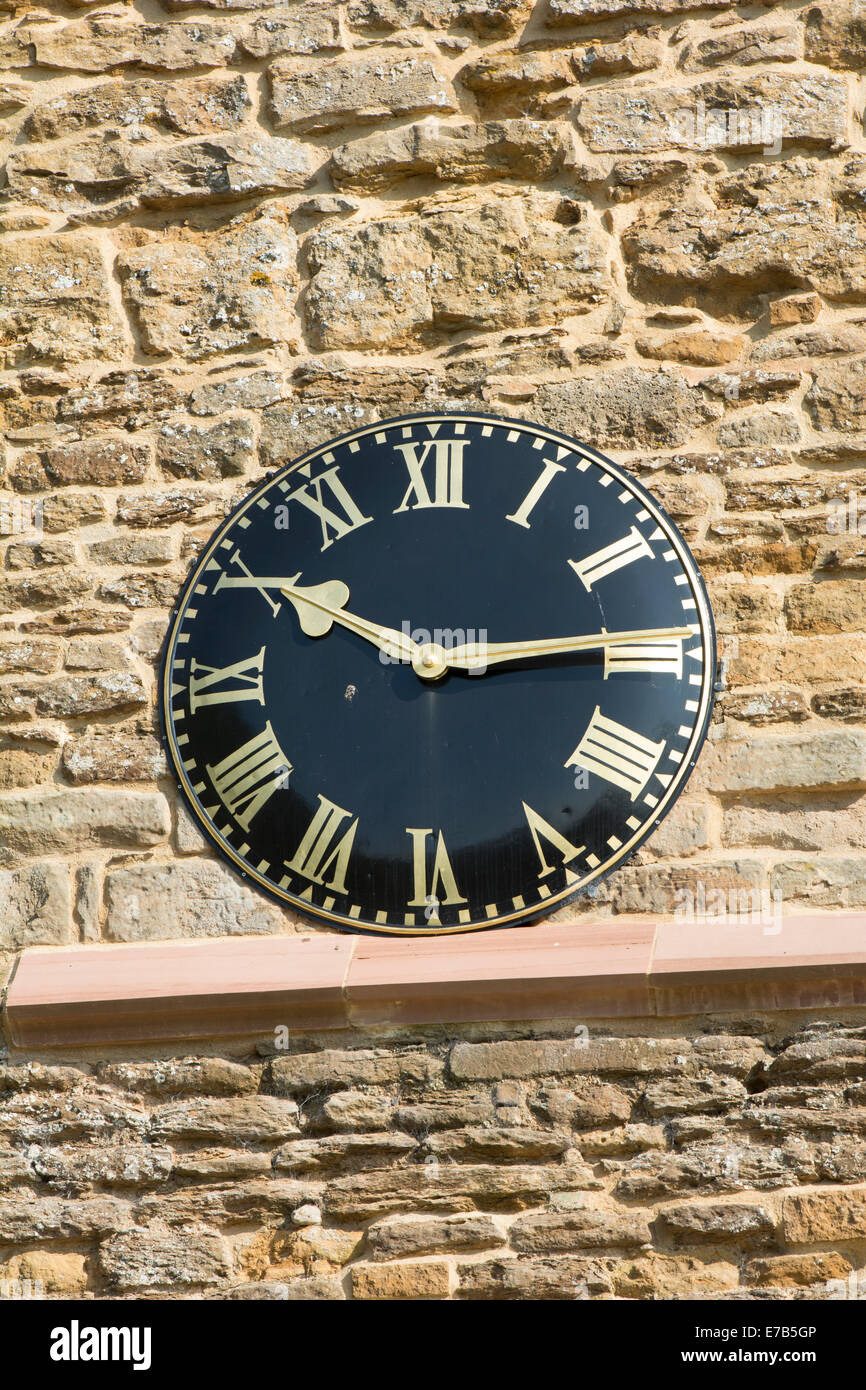 St. Peter and St. Paul`s Church clock, Watford, Northamptonshire, England, UK Stock Photo